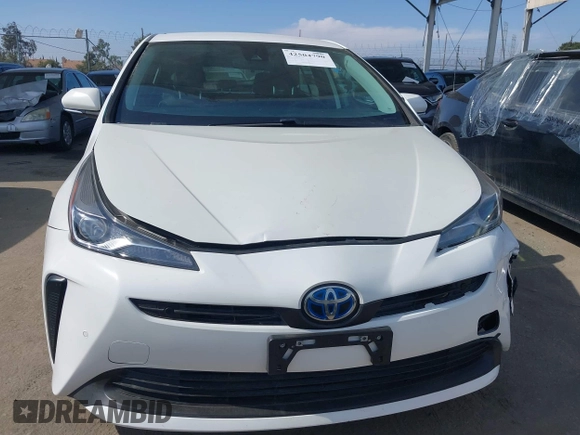 2022 Toyota Prius L Eco z VIN JTDKAMFU6N3177732, wystawiony jako IAAI lot #42504790 z przebiegiem 65 338 mil mil oraz . Historia ofert i sprzedaży dostępna na DreamBid. Obrazek 12.
