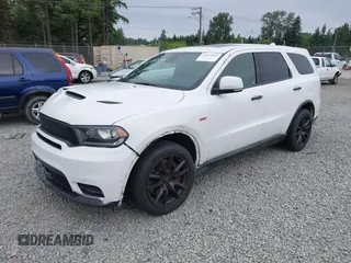 2019 Dodge Durango SRT with VIN 1C4SDJGJ0KC581440, listed as a IAAI auction lot 42473821 with 40,068 mi miles and . Bid and sale history available at DreamBid. Image 2.