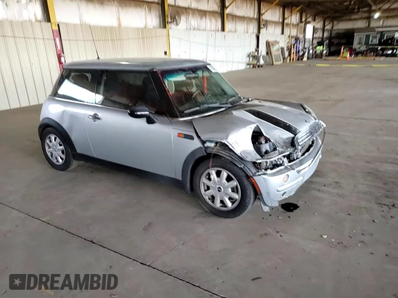 2004 MINI Hardtop with VIN WMWRC33404TJ58046, listed as a Copart auction lot 46358625 with 140,934 mi miles and Salvage Title. Bid and sale history available at DreamBid. Image 11.