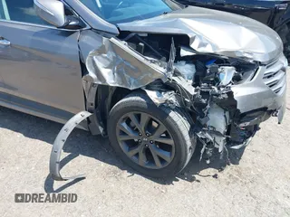 2017 Hyundai Santa Fe Ultimate z VIN 5NMZW4LA7HH047989, wystawiony jako IAAI lot #42051500 z przebiegiem 75 747 mil mil oraz . Historia ofert i sprzedaży dostępna na DreamBid. Obrazek 6.