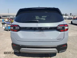 2023 Honda Pilot Touring with VIN 5FNYG2H7XPB011420, listed as a Copart auction lot 69799314 with 9,601 mi miles and Salvage Title. Bid and sale history available at carsss.com. Image 6.