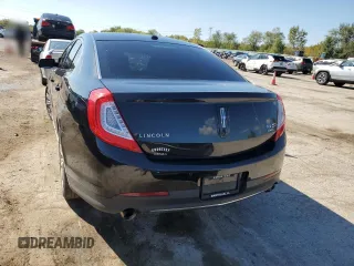 2013 Lincoln MKS EcoBoost with VIN 1LNHL9FT9DG612206, listed as a Copart auction lot 73112854 with Not Provided miles and Salvage Title. Bid and sale history available at DreamBid. Image 6.