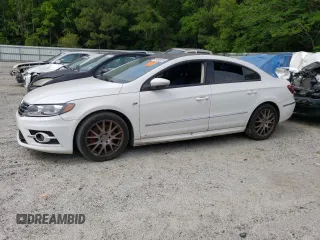 2015 Volkswagen CC R-Line with VIN WVWBN7AN1FE802582, listed as a Copart auction lot 49492973 with 124,521 mi miles. Bid and sale history available at carsss.com. Image 1.