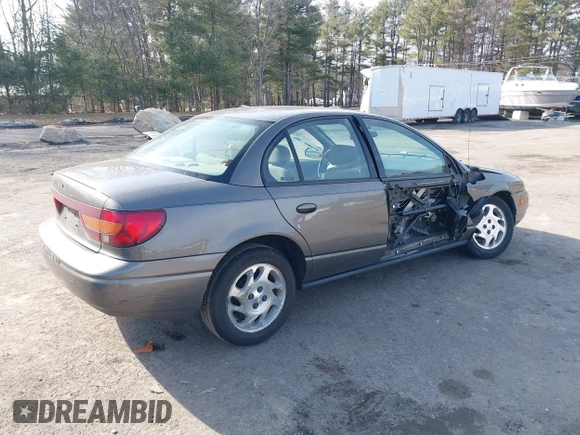 2000 Saturn SL z VIN 1G8ZK5275YZ244530, wystawiony jako IAAI lot #41784896 z przebiegiem 50 332 mil mil oraz . Historia ofert i sprzedaży dostępna na DreamBid. Obrazek 4.