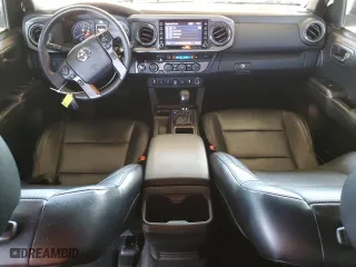 2023 Toyota Tacoma 4WD SR with VIN 3TMCZ5AN6PM612625, listed as a Copart auction lot 50152015 with 32,156 mi miles and Salvage Title. Bid and sale history available at carsss.com. Image 8.