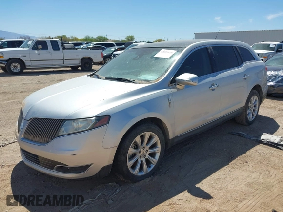 2013 Lincoln MKT with VIN 2LMHJ5FK3DBL59384, listed as a IAAI auction lot 42099478 with 187,367 mi miles and . Bid and sale history available at DreamBid. Image 2.