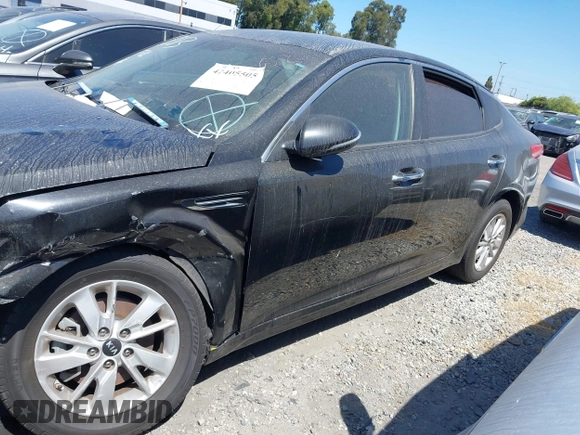2017 Kia Optima LX z VIN KNAGT4L33H5156094, wystawiony jako IAAI lot #42405505 z przebiegiem 111 622 mil mil oraz . Historia ofert i sprzedaży dostępna na DreamBid. Obrazek 14.