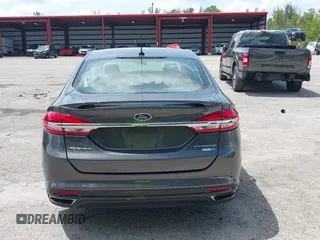 2018 Ford Fusion Titanium with VIN 3FA6P0D9XJR169657, listed as a IAAI auction lot 42392112 with 62,754 mi miles and . Bid and sale history available at DreamBid. Image 17.