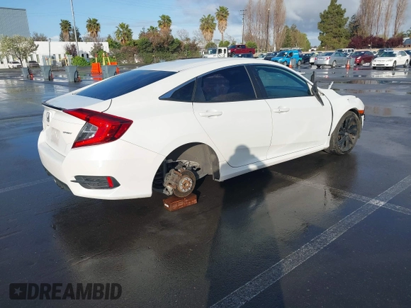 2019 Honda Civic Sport with VIN 19XFC2F86KE215368, listed as a IAAI auction lot 41934715 with 50,253 mi miles and . Bid and sale history available at DreamBid. Image 4.