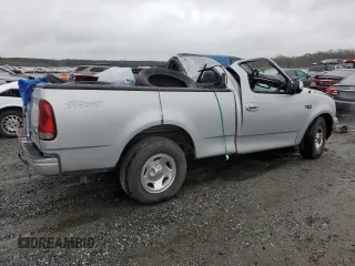 2003 Ford F-150 XL with VIN 1FTRF172X3NB77391, listed as a Copart auction lot 80657174 with Not Provided miles and Salvage Title. Bid and sale history available at DreamBid. Image 3.