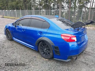 2015 Subaru WRX Premium with VIN JF1VA1D66F8816248, listed as a IAAI auction lot 41831732 with 123,048 mi miles. Bid and sale history available at carsss.com. Image 3.