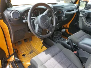 2012 Jeep Wrangler Sport with VIN 1C4AJWAG6CL247929, listed as a Copart auction lot 58942515 with 113,833 mi miles and Salvage title. Bid and sale history available at DreamBid. Image 8.