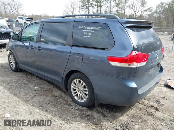 2014 Toyota Sienna XLE with VIN 5TDYK3DC9ES511035, listed as a IAAI auction lot 41884115 with 153,071 mi miles. Bid and sale history available at carsss.com. Image 3.