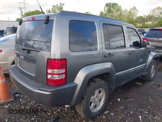 2012 Jeep Liberty Sport with VIN 1C4PJMAK1CW198611, listed as a IAAI auction lot 42187221 with 118,623 mi miles. Bid and sale history available at carsss.com. Image 4.