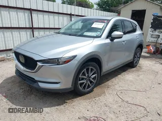2018 Mazda CX-5 Grand Touring with VIN JM3KFADM6J0339185, listed as a IAAI auction lot 42160763 with 86,312 mi miles and . Bid and sale history available at DreamBid. Image 17.