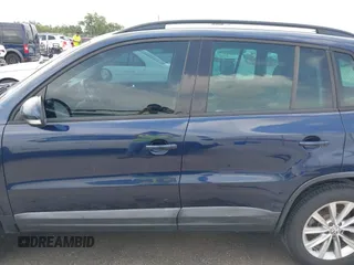 2015 Volkswagen Tiguan SE with VIN WVGAV7AX1FW508313, listed as a IAAI auction lot 42120704 with 136,405 mi miles and . Bid and sale history available at DreamBid. Image 14.