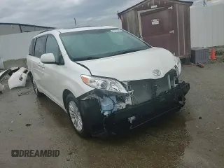 2015 Toyota Sienna XLE with VIN 5TDYK3DC6FS630405, listed as a Copart auction lot 59872045 with 60,306 mi miles and Salvage title. Bid and sale history available at DreamBid. Image 15.