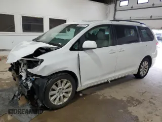 2014 Toyota Sienna Limited with VIN 5TDDK3DC0ES094046, listed as a Copart auction lot 59884265 with 136,566 mi miles and Salvage title. Bid and sale history available at DreamBid. Image 1.