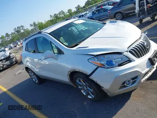 2016 Buick Encore Premium with VIN KL4CJDSB1GB647306, listed as a IAAI auction lot 41983159 with 59,592 mi miles. Bid and sale history available at carsss.com. Image 1.