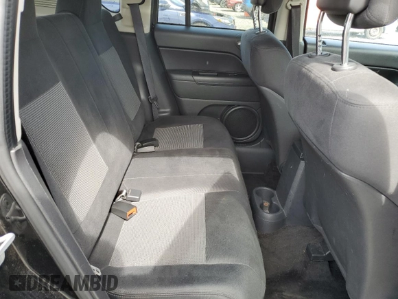 2013 Jeep Compass Sport with VIN 1C4NJCBB8DD246621, listed as a Copart auction lot 52545315 with 113,856 mi miles and Salvage Title. Bid and sale history available at carsss.com. Image 11.