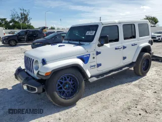 2022 Jeep Wrangler Unlimited Sahara Altitude with VIN 1C4HJXEG1NW254593, listed as a Copart auction lot 64974425 with 50,215 mi miles and Salvage title. Bid and sale history available at DreamBid. Image 1.