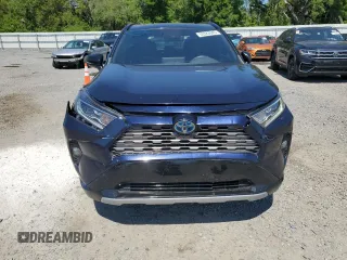 2021 Toyota RAV4 Hybrid XSE with VIN 2T3E6RFV9MW016128, listed as a Copart auction lot 53323945 with 134,009 mi miles and Salvage title. Bid and sale history available at DreamBid. Image 5.