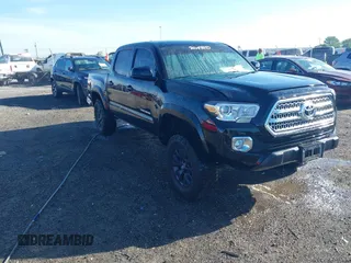 2023 Toyota Tacoma SR5 z VIN 3TYAZ5CN5PT036387, wystawiony jako IAAI lot #42077284 z przebiegiem 34 568 mil mil oraz . Historia ofert i sprzedaży dostępna na DreamBid. Obrazek 1.