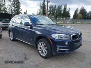 2015 BMW X5 xDrive35d with VIN 5UXKS4C55F0J98874, listed as a IAAI auction lot 42030583 with 151,079 mi miles. Bid and sale history available at carsss.com. Image 1.