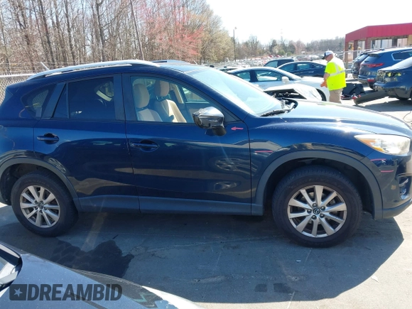 2016 Mazda CX-5 Touring with VIN JM3KE4CY0G0631786, listed as a IAAI auction lot 41761214 with 220,058 mi miles. Bid and sale history available at carsss.com. Image 13.