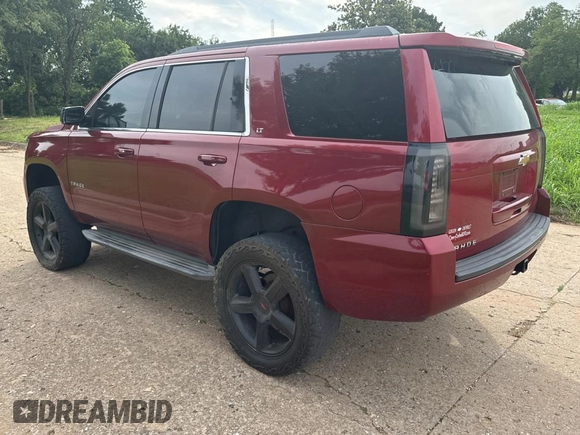 2015 Chevrolet Tahoe LT z VIN 1GNSKBKC4FR103035, wystawiony jako Copart lot #60753305 z przebiegiem 226 136 mil mil oraz Czysty tytuł • Clean title. Historia ofert i sprzedaży dostępna na DreamBid. Obrazek 3.