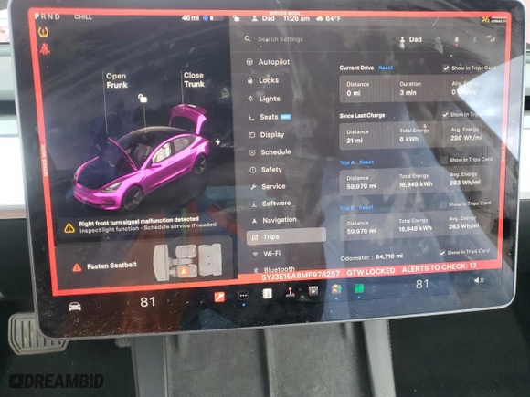 2021 Tesla Model 3 Standard Range Plus with VIN 5YJ3E1EA8MF978257, listed as a Copart auction lot 48592605 with 84,710 mi miles and Salvage Title. Bid and sale history available at carsss.com. Image 9.