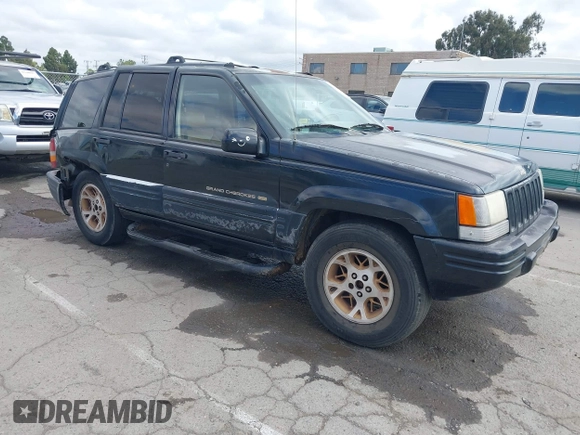 1996 Jeep Grand Cherokee Limited z VIN 1J4GZ78Y3TC191000, wystawiony jako IAAI lot #42259621 z przebiegiem 212 690 mil mil oraz . Historia ofert i sprzedaży dostępna na DreamBid. Obrazek 1.