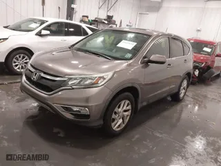 2015 Honda CR-V EX with VIN 3CZRM3H54FG712264, listed as a IAAI auction lot 41619854 with 119,077 mi miles. Bid and sale history available at carsss.com. Image 2.