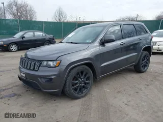 2018 Jeep Grand Cherokee Laredo E with VIN 1C4RJFAG4JC464783, listed as a IAAI auction lot 41664453 with 106,466 mi miles. Bid and sale history available at carsss.com. Image 17.