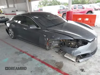 2021 Tesla Model S Long Range Plus с VIN 5YJSA1E28MF421655, выставлен на аукционе IAAI как лот 42407234 с пробегом 111 443 миль миль и . История ставок и продаж доступна на DreamBid. Изображение 1.