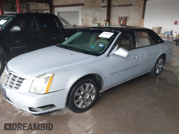 2007 Cadillac DTS Luxury I with VIN 1G6KD57Y87U156301, listed as a IAAI auction lot 42120819 with 154,840 mi miles and . Bid and sale history available at DreamBid. Image 2.