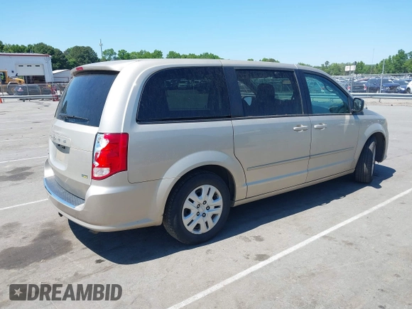 2015 Dodge Grand Caravan American Value with VIN 2C4RDGBG3FR647957, listed as a IAAI auction lot 42147813 with 129,859 mi miles and . Bid and sale history available at DreamBid. Image 4.
