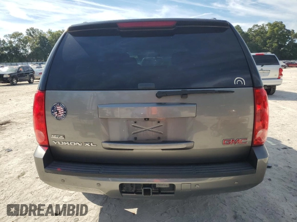 2012 GMC Yukon XL SLE with VIN 1GKS1HE06CR250652, listed as a Copart auction lot 74424294 with 129,208 mi miles and Salvage Title. Bid and sale history available at carsss.com. Image 6.