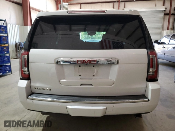 2020 GMC Yukon Denali with VIN 1GKS1CKJ3LR107335, listed as a Copart auction lot 49971315 with 139,967 mi miles and Salvage Title. Bid and sale history available at carsss.com. Image 6.