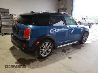 2018 MINI Countryman Cooper с VIN WMZYV5C31J3E04614, выставлен на аукционе Copart как лот 57802375 с пробегом 121 302 миль миль и Списание • Salvage title. История ставок и продаж доступна на DreamBid. Изображение 3.