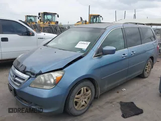 2007 Honda Odyssey EX-L with VIN 5FNRL38717B127157, listed as a IAAI auction lot 41890838 with 195,241 mi miles and . Bid and sale history available at DreamBid. Image 2.