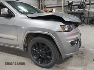 2018 Jeep Grand Cherokee Laredo E with VIN 1C4RJFAG6JC102969, listed as a IAAI auction lot 41963137 with 112,361 mi miles and . Bid and sale history available at DreamBid. Image 18.
