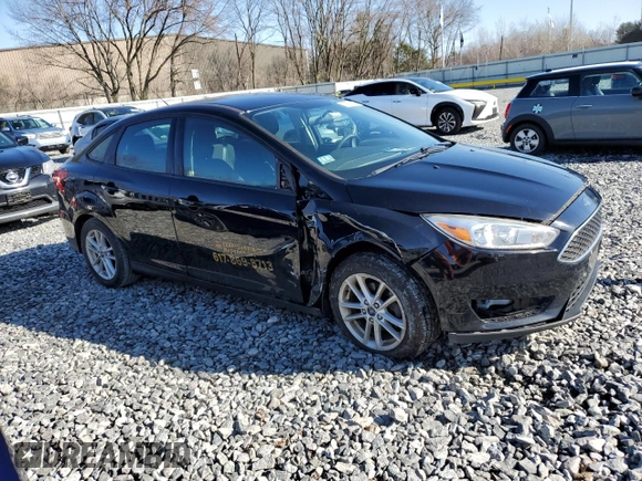 2018 Ford Focus SE with VIN 1FADP3FE9JL306394, listed as a Copart auction lot 52902175 with 77,338 mi miles and Salvage title. Bid and sale history available at DreamBid. Image 4.