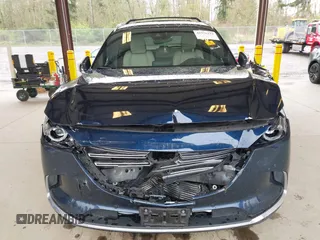 2018 Mazda CX-9 Grand Touring with VIN JM3TCBDY0J0216195, listed as a IAAI auction lot 41976122 with 90,083 mi miles and . Bid and sale history available at carsss.com. Image 6.