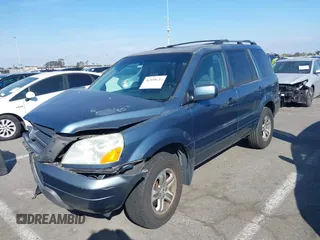 2005 Honda Pilot EX-L with VIN 2HKYF18565H534394, listed as a IAAI auction lot 41539630 with 168,384 mi miles. Bid and sale history available at carsss.com. Image 17.