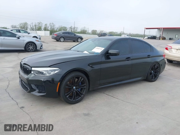 2019 BMW M5 z VIN WBSJF0C51KB447804, wystawiony jako IAAI lot #41848760 z przebiegiem 83 303 mil mil oraz . Historia ofert i sprzedaży dostępna na DreamBid. Obrazek 17.