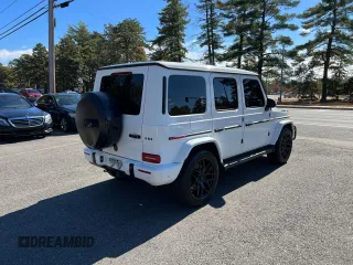 2019 Mercedes-Benz G 63 AMG with VIN WDCYC7HJ8KX308215, listed as a Copart auction lot 77123674 with 93,594 mi miles and Clean Title. Bid and sale history available at DreamBid. Image 4.