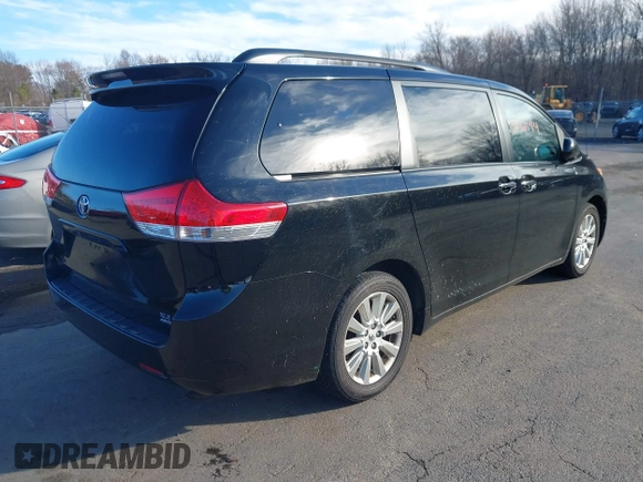 2013 Toyota Sienna XLE with VIN 5TDDK3DC0DS067993, listed as a IAAI auction lot 41832594 with 159,364 mi miles and . Bid and sale history available at DreamBid. Image 4.