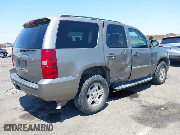 2007 Chevrolet Tahoe LT with VIN 1GNFC13J87R242057, listed as a IAAI auction lot 42736911 with 162,569 mi miles and . Bid and sale history available at DreamBid. Image 4.