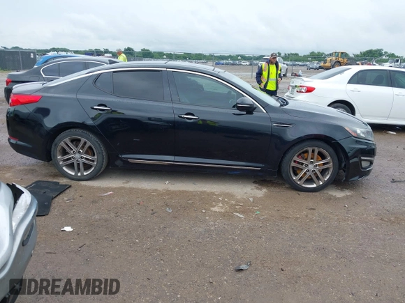 2013 Kia Optima SX with VIN 5XXGR4A64DG207512, listed as a IAAI auction lot 42483528 with 127,748 mi miles and . Bid and sale history available at DreamBid. Image 13.